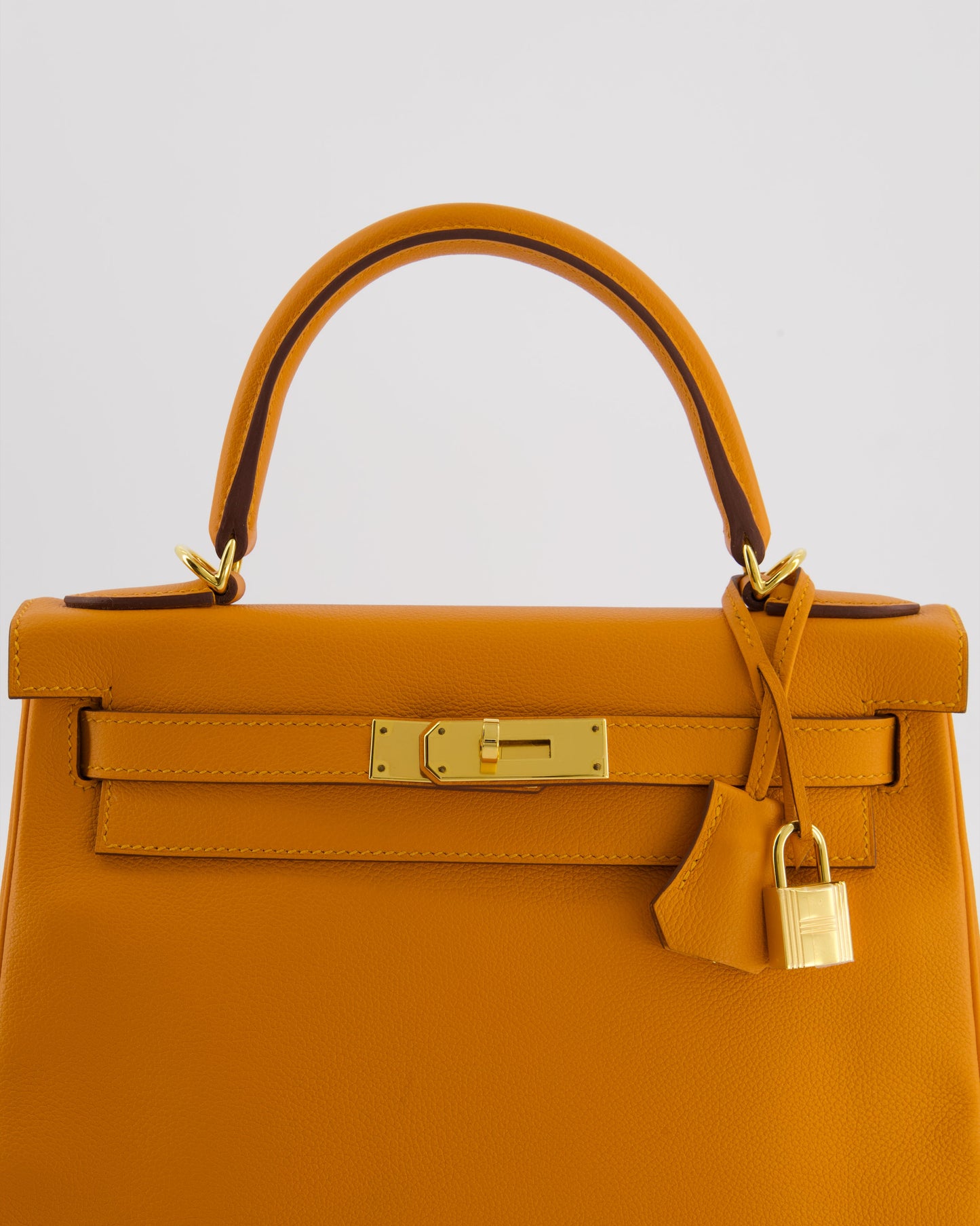 Hermes Kelly 28 Retourne Bag in Abricot Evercolor Leather with Gold Hardware